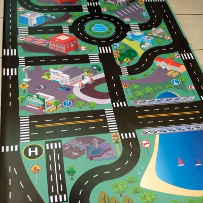 Pista de autos en lona de 90x200 cms.