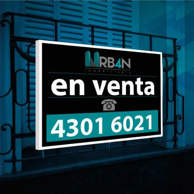 Cartel impreso en lona armado en bastidor para inmobiliarias en 2 formatos